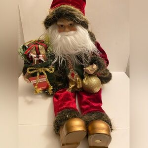 Elegant Santa Claus Holiday Decor with Gold and Red Details